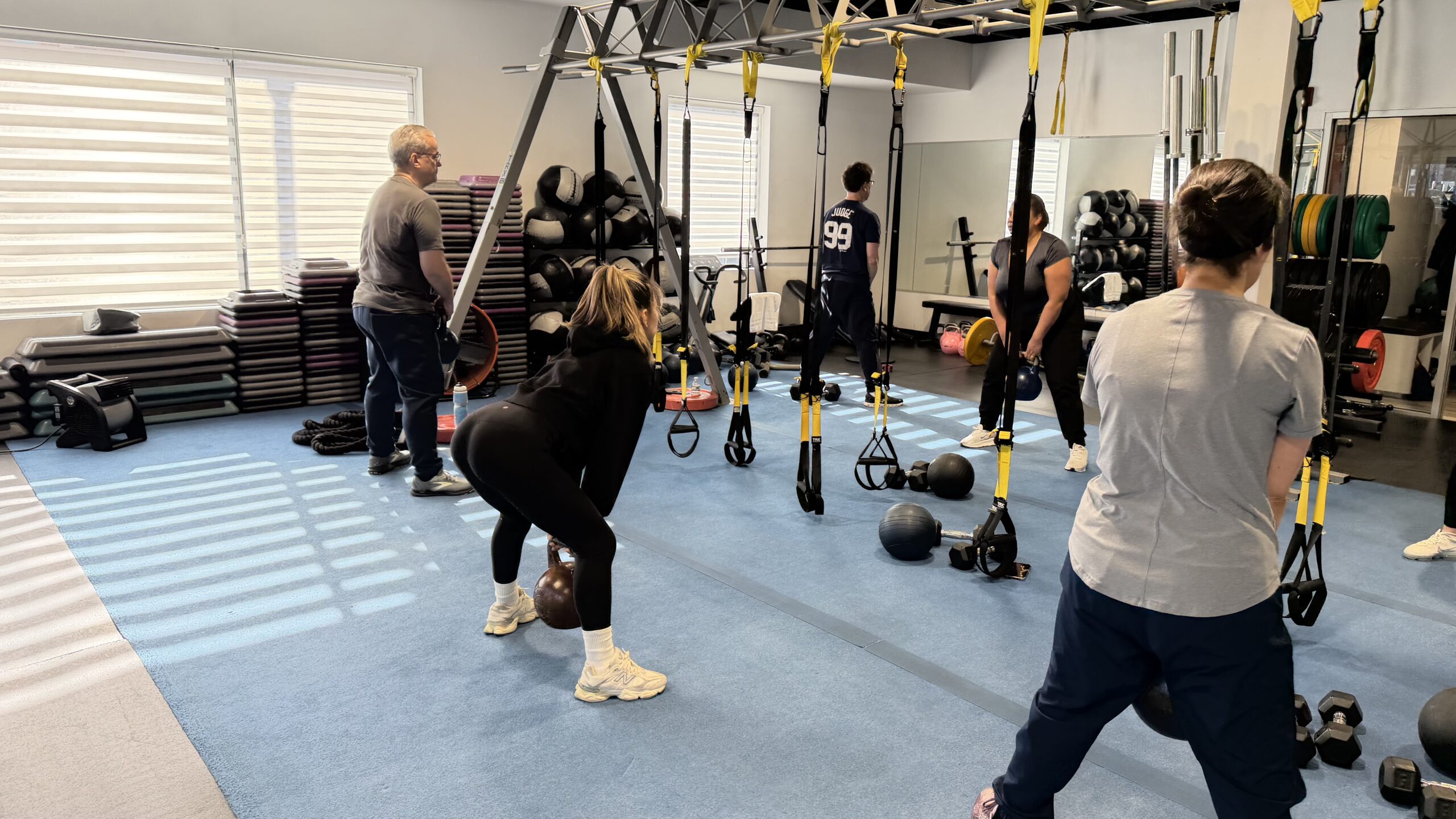 Trainer and client celebrating after a session